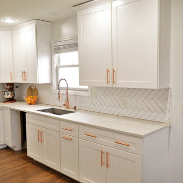 Goshen, IN. BaileyTown USA Select. White Kitchen with Rose Gold Accents
