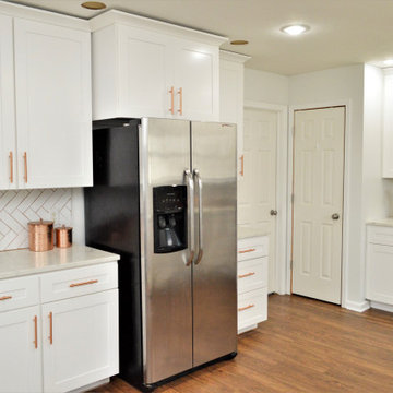 Goshen, IN. BaileyTown USA Select. White Kitchen with Rose Gold Accents