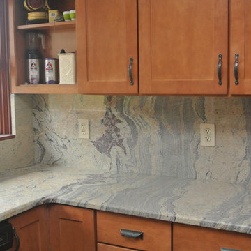 Granite Countertop with full Granite Backsplash