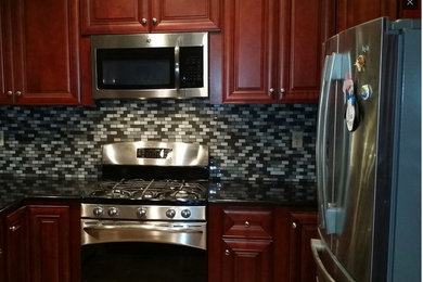 Mid-sized minimalist kitchen photo in Orange County