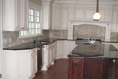 Inspiration for a large kitchen remodel in New York with granite countertops, stainless steel appliances and an island
