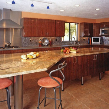 Granite Island with Corian perimeter tops & Stainless Cooking Area