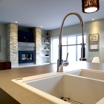 granite sink with fireplace in background