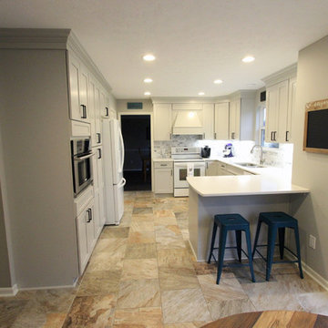 Gray and White Kitchen with Eternia Quartz and Marble Mosaic Backsplash