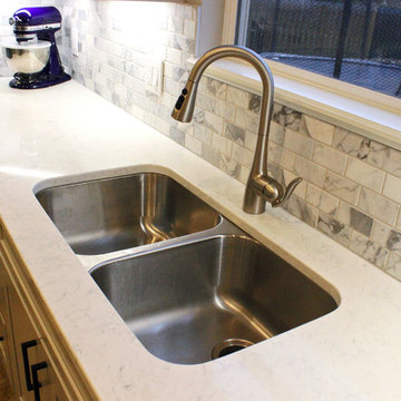 Gray and White Kitchen with Eternia Quartz and Marble Mosaic Backsplash