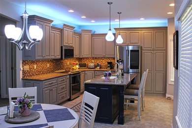 Gray kitchen cabinets with blue island