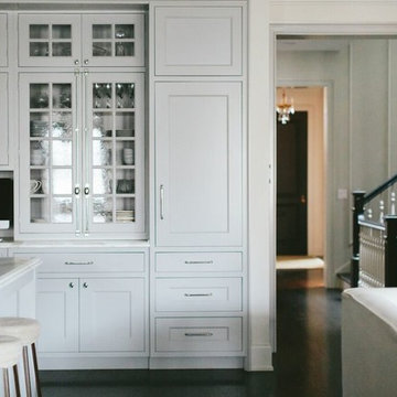 Gray painted kitchen with built-in storage