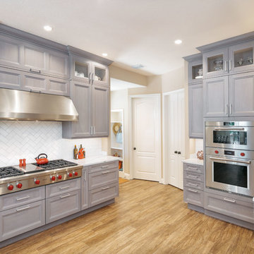 Gray-Stained Walnut Cabinetry Houses Gourmet Appliances