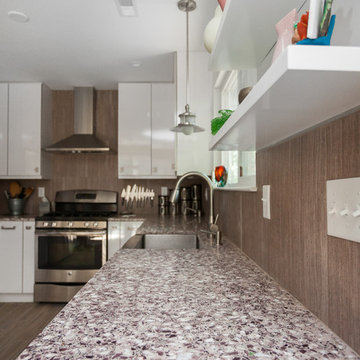 Great backsplash detail with "Phoenix" colors in the recycled glass counters