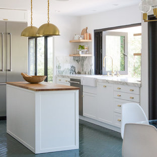 Inspiration for a large contemporary l-shaped separate kitchen in Los Angeles with recessed-panel cabinets, white cabinets, marble benchtops, multi-coloured splashback, marble splashback, stainless steel appliances, brick floors, with island, green floor and green benchtop.