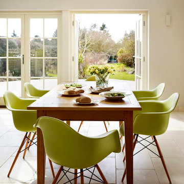 Green kitchen dining - Charles and Ray Eames chairs