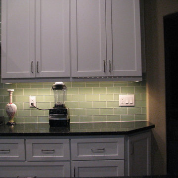 Green Tile With Black Counter Top