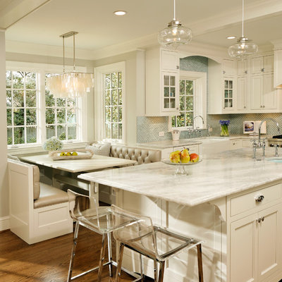 Elegant kitchen photo in DC Metro with mosaic tile backsplash, quartzite countertops, a farmhouse sink, recessed-panel cabinets, white cabinets, blue backsplash and white countertops