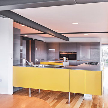 Grey & Yellow open plan kitchen