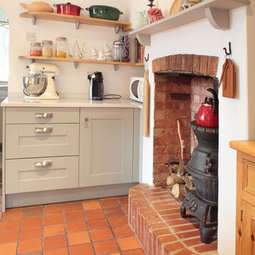 Grey country kitchen with traditional features