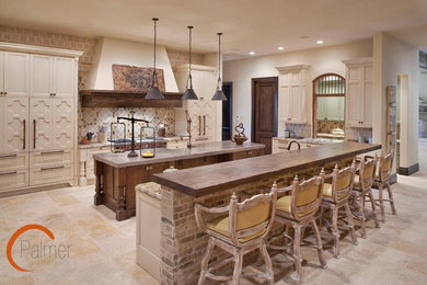 Mountain style kitchen photo in Austin with white cabinets and paneled appliances