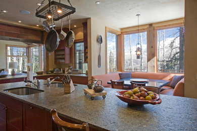Inspiration for a timeless light wood floor kitchen remodel in Denver with an undermount sink and an island