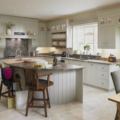 Inspiration for a mid-sized timeless l-shaped beige floor eat-in kitchen remodel in Wiltshire with gray cabinets, granite countertops, black backsplash, an island, a double-bowl sink and shaker cabinets