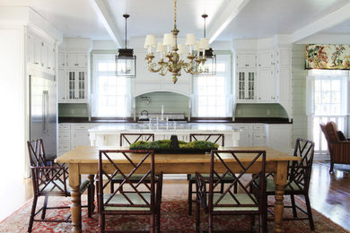 Open concept kitchen - traditional galley open concept kitchen idea in Atlanta with recessed-panel cabinets, white cabinets and stainless steel appliances