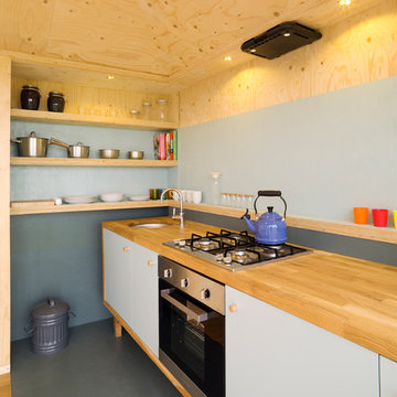 Hand-built kitchen with oakstrip worktop.