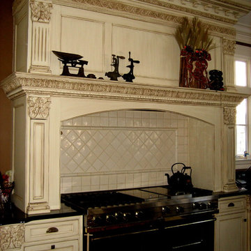 hand painted and distressed kitchen cabinetry