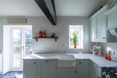 This is an example of a farmhouse kitchen in Kent.