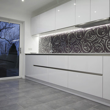 Handle-less gloss kitchen in East Harlsey