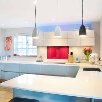 Handle-less high gloss blue & matt white kitchen