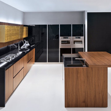 Handle-less kitchen in Walnut veneer & high gloss lacquer | "Venezia" by Biefbi