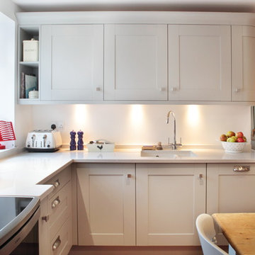 Handled grey country kitchen with quartz worktop