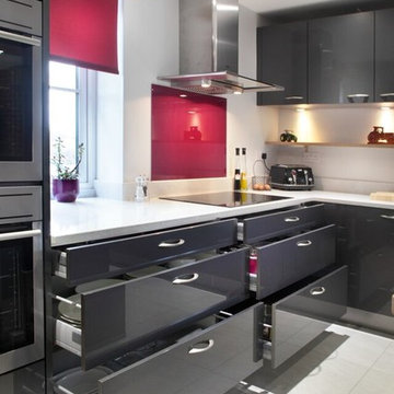 Handleless dark grey kitchen with a variety of storage