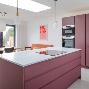 Inspiration for a mid-sized contemporary l-shaped eat-in kitchen in Other with a drop-in sink, flat-panel cabinets, purple cabinets, quartzite benchtops, white splashback, concrete floors, with island, grey floor and white benchtop.