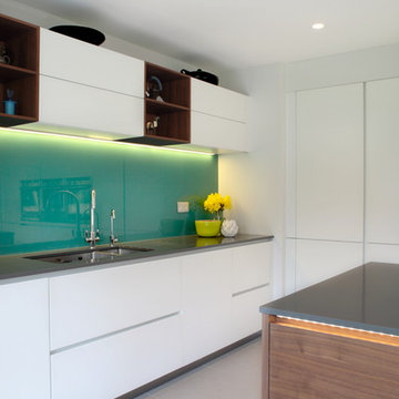 Handleless white kitchen with a variety of storage options
