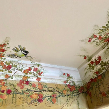 Handpainted flowering vines and birds in sofit