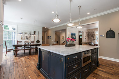 Inspiration for a cottage dark wood floor and brown floor eat-in kitchen remodel in Minneapolis