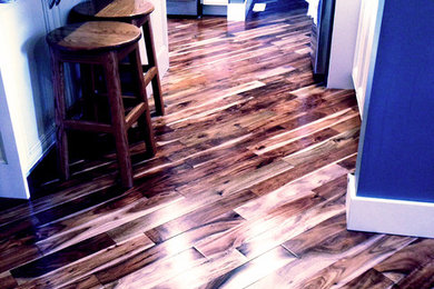 Kitchen - traditional medium tone wood floor kitchen idea in Other