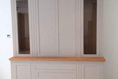 hardwood kitchen dresser sprayed in Farrow and Ball elephants breath.