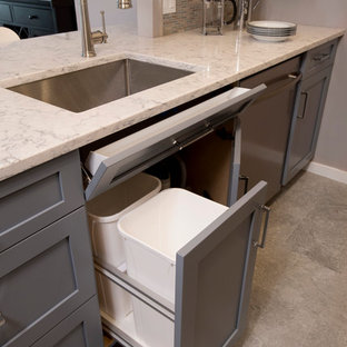 Small transitional eat-in kitchen remodeling - Eat-in kitchen - small transitional galley porcelain tile eat-in kitchen idea in Boston with an undermount sink, shaker cabinets, blue cabinets, quartz countertops, multicolored backsplash, mosaic tile backsplash, stainless steel appliances and a peninsula