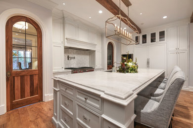 Eat-in kitchen - traditional medium tone wood floor and brown floor eat-in kitchen idea in Chicago with a single-bowl sink, shaker cabinets, gray cabinets, quartzite countertops, white backsplash, stone slab backsplash, stainless steel appliances, two islands and white countertops