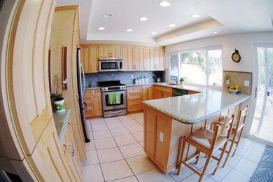 Island style kitchen photo in Los Angeles