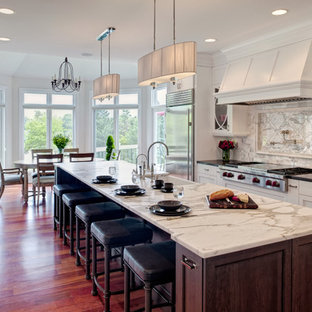 Transitional eat-in kitchen photos - Eat-in kitchen - transitional eat-in kitchen idea in Chicago with white cabinets, marble countertops, stainless steel appliances, a farmhouse sink and recessed-panel cabinets