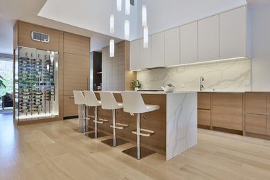 Example of a mid-sized danish l-shaped light wood floor and beige floor eat-in kitchen design in Toronto with a single-bowl sink, flat-panel cabinets, light wood cabinets, quartz countertops, white backsplash, stone slab backsplash, paneled appliances, an island and white countertops