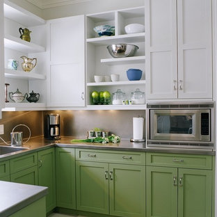 Design ideas for a transitional u-shaped kitchen in Nashville with an integrated sink, shaker cabinets, green cabinets, stainless steel benchtops, metallic splashback, stainless steel appliances and no island.
