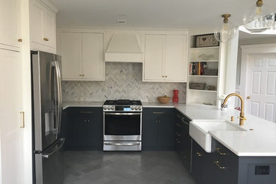 Mid-sized transitional u-shaped ceramic tile and gray floor eat-in kitchen photo in Philadelphia with a farmhouse sink, beaded inset cabinets, blue cabinets, quartz countertops, gray backsplash, marble backsplash, stainless steel appliances, a peninsula and white countertops