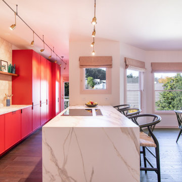 Hex Tiles with Red Kitchen Cabinets