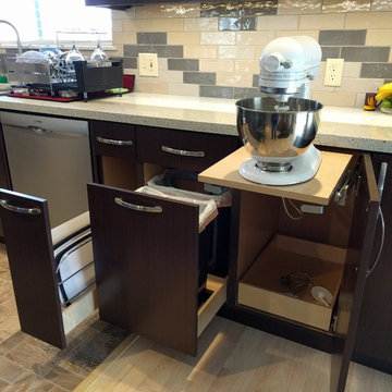 Hidden appliance and storage organization in new kitchen