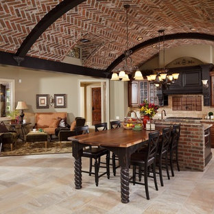 Photo of a traditional open plan kitchen in Houston with raised-panel cabinets, dark wood cabinets, granite benchtops, beige splashback, beige floor and slate splashback.