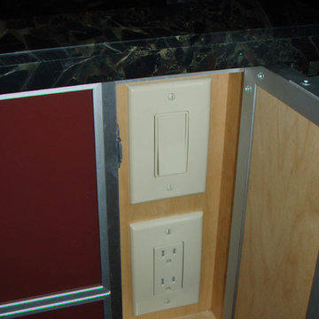 Hidden light-switch and outlet in a Maui Kitchen Island