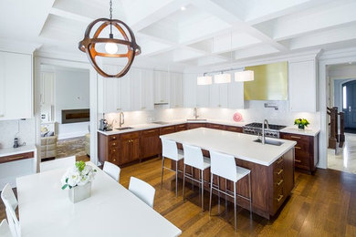 Eat-in kitchen - large transitional l-shaped dark wood floor and brown floor eat-in kitchen idea in Toronto with recessed-panel cabinets, medium tone wood cabinets, an island, quartz countertops, white backsplash, mosaic tile backsplash, stainless steel appliances and an undermount sink