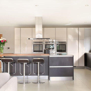 High gloss cashmere & black kitchen with large island